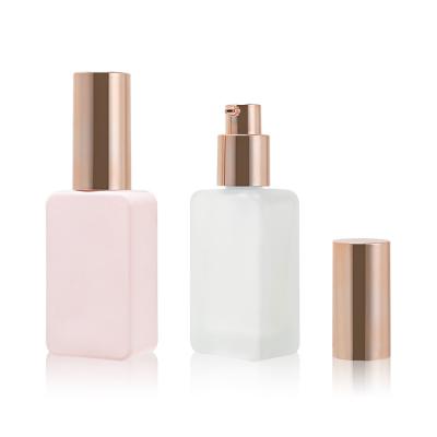 China 30ML Empty Foundation Glass Bottle Square Clear Frosted Cosmetic Packaging for sale