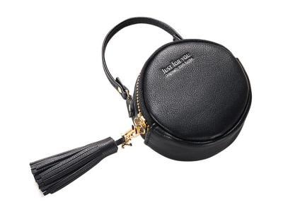 China Small Round Pu Leather Bag Fashion Hand Take Change Card Package With Tassel for sale