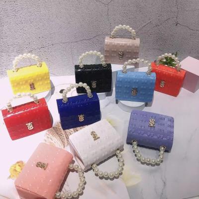 China Fashion Summer Mini Women Pearl Clutch Cute Girls Personality Decoration Jelly Purses And Bags for sale