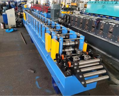 China Chain Drive Rolling Shutter Door Roll Forming Machine High Speed Full Auto 25m/Min for sale
