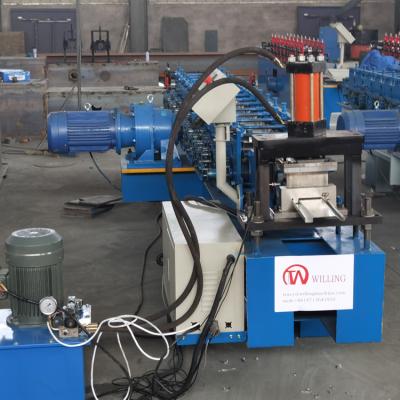 China Ppgi High Accuracy Shutter Door Roll Forming Machine Hydraulic Shears for sale