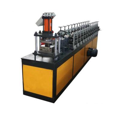 China 0.6mm Gear Shutter Door Roll Forming Machine Automatic Steel Sheet Roller for sale