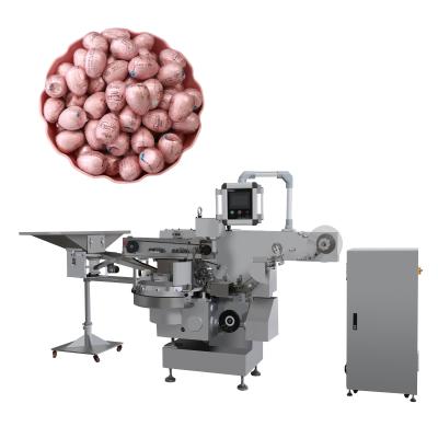 China Customized 380V Voltage SHENGLI Chocolate Wrapping Machine For Eggs Balls Chocolate for sale