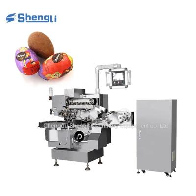 China Chocolate Hollow Egg/Ball Foil Wrapping Machine with Long Service Life at 220V Voltage for sale