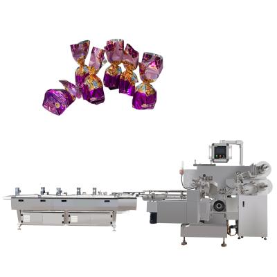 China Chocolate Silver Customized Key Horizontal Wrapping Packing Machine for Candy Packaging for sale