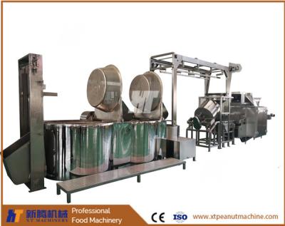 中国 塩漬けのピーナッツ ガス フライヤー機械 2000KGS/H ピーナツの揚げ物および皮をむく機械 販売のため