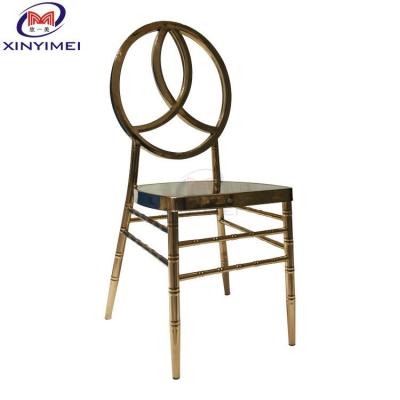 China Restaurant Gold Stainless Steel Dining Chair Hotel Simple Mirror Metal Phoenix Chair en venta
