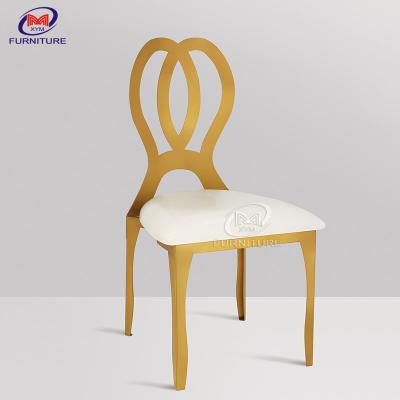 China Silla y mesa de acero inoxidable con respaldo de mariposa, silla dorada para banquete de bodas en venta