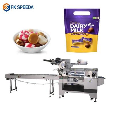 China FK-Z602 Hard Sweets Granule Pack Horizontal Pillow Type Candy Flow Wrap Packaging Machine for sale