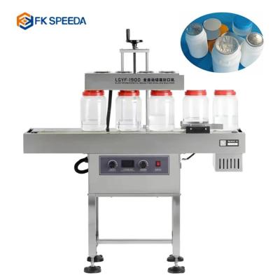 China Continuous Sealing Machine With Electromagnetic Induction 220V/50-60HZ for sale