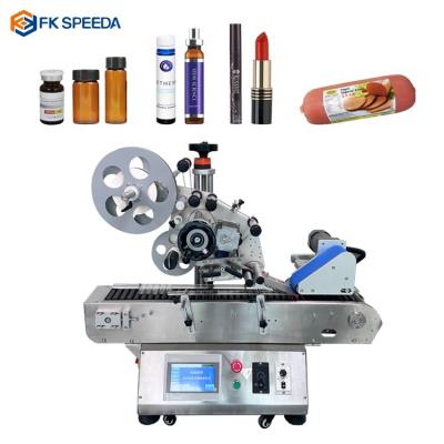 China Tabletop Horizontal Labeling Machine for Small Cylinder Tube Round Plastic Glass Tube for sale