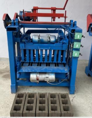 China 8.8kw Power Cement Brick Making Machine for 1-14 Bricks Molding Quantity Production for sale