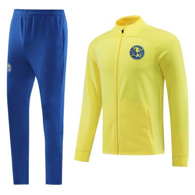 China Custom Yellow Youth Football Team Tracksuits Soccer Training Shirt for sale