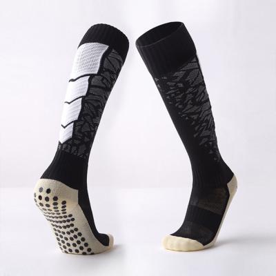 China El apretón del fútbol de la tela pega calcetines suaves del apretón del fútbol del negro del tejido de poliester en venta