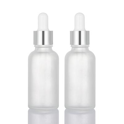 China Matte White Glass Essential Oil Dropper Bottles 30ml With Silver Cap for sale