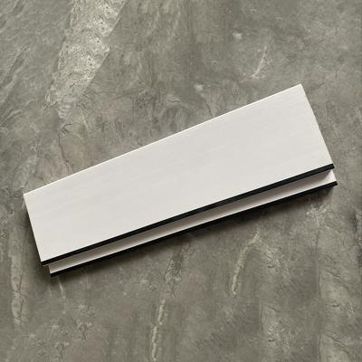 China Waterproof SPC Decorative Skirting Boards PVC Baseboard Moulding for sale