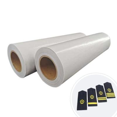 China EVA Paper Roll Hot Melt Adhesive Films For Textile Fabric Embroidery Patch for sale