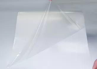 China Filme esparadrapo do derretimento quente transparente do estiramento 0.05mm para a ligação da tela de matéria têxtil à venda