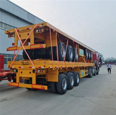 China Heavy Duty Transport Semi Trailer 3 Axles Transport Flatbed Trailer 30t for sale