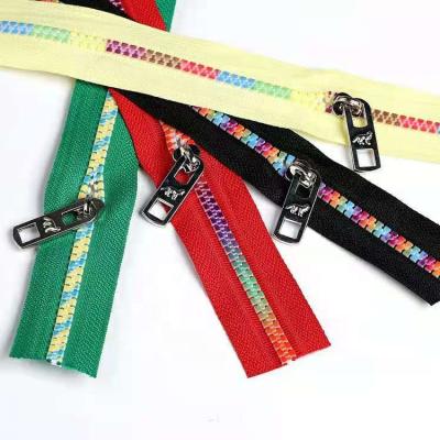 China Custom Colors Fashion Teeth Fashion Auto Lock WYSE Factory Zipper 5# Open End Resin Plastic Zippers For Clothing for sale