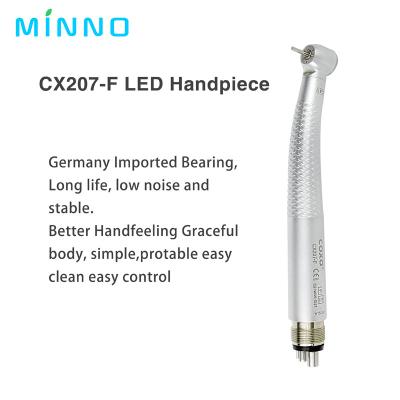 China 300000rpm Coxo High Speed Handpiece 4 Hole LED Dental Handpiece With 3 Way Spray for sale