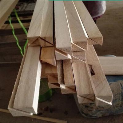 China 11mm x 11mm Wood Chamfer Paulownia Triangle Wood Strips with Moisture Content 8%-12% for sale