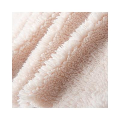 China Embossed Super Soft 100 Polyester Knitted Custom Mirco Sherpa Fleece Fabric for Lining for sale