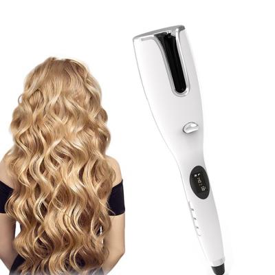 China 50W Auto Rotating Hair Curler Rotating Hair Curling Iron For Women for sale