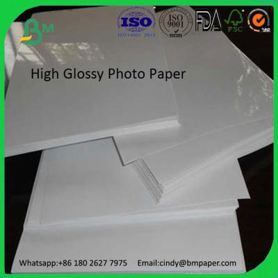 China Good quality 210gsm 230gsm 250gsm 300gsm 400gsm  cast coated glossy inkjet photo paper à venda