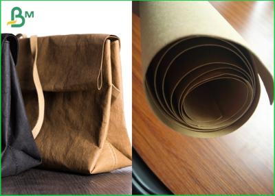 China Virgin And Natural Fabric Material Kraft Liner Paper For Handbags And Jeans for sale