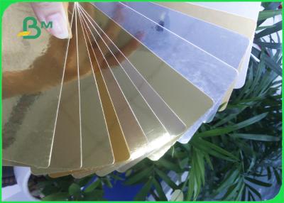 China rollo del papel de la cartulina 275GSM, oro del papel de aluminio/tarjeta de papel de plata para el paquete estupendo del regalo en venta