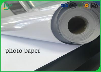 China Roll 24 Inch 36 Inch Absorb Printing Ink One Side High Glossy Photo Paper for sale