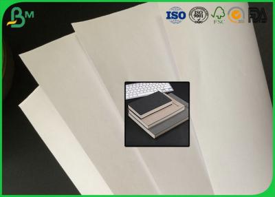 China papel revestido lustroso absorvente de tinta de impressão 80g para fazer o livro de nota à venda