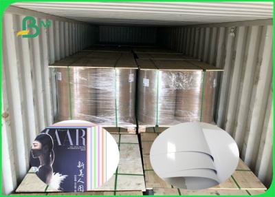 China 140 - 300gsm Ink Absorption High Speed Printing Mirror Surface Cast Coated Paper In Roll for sale