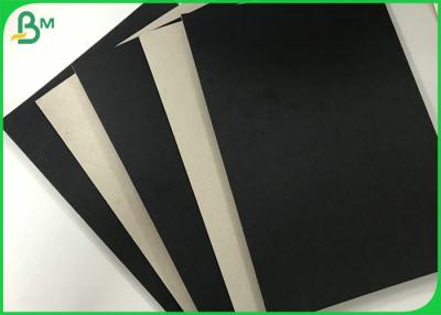 China Foldable 1.2mm 1.5mm Single Black Covered Cardboard Paper Grey Back For Gift Box for sale