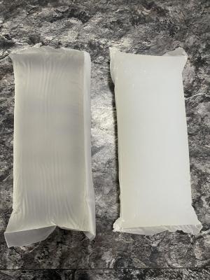 China Pegamento adhesivo elástico del PSA del derretimiento caliente de goma de los bloques para los pañales del bebé en venta