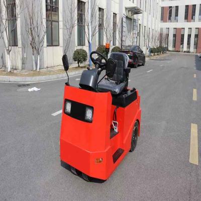 中国 Electric Towing Tractor Sit-down American CURTIS Electronic Steering Easy to Operate Stepless Adjustment 販売のため