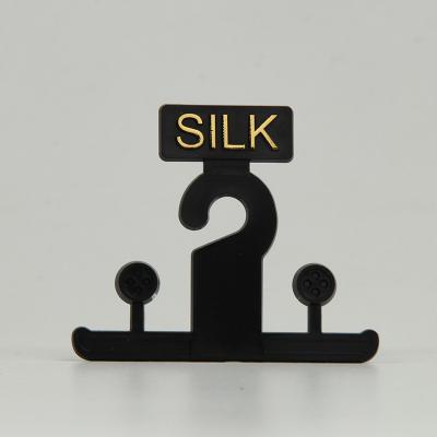China PP Custom Plastic Hangers Black With Gold Logo For Suspenders for sale
