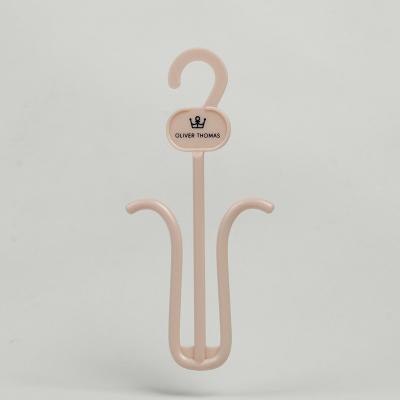 China Naked Pink Custom Logo Printing Plastic Shoes Hanger For Women's Footwear for sale