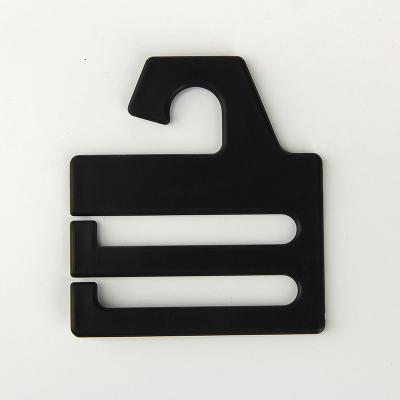 China Custom Black 6.1*7.4CM PS Plastic Tie Hangers With Logo for sale