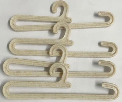 China 90mm*25mm Eco Wheat Straw Plastic Sock Hooks Nature Color Small Plastic Hanger for sale