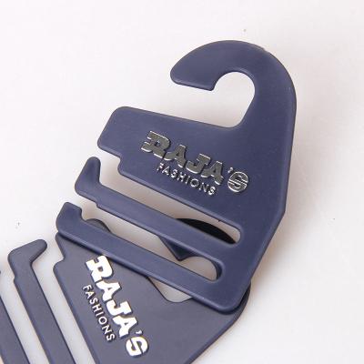China Personalized Label Non Slip Plastic Tie Hangers With Silver Logo Embossed for sale