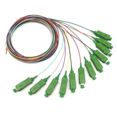 Китай 12 отрезка провода волокна одиночных режима PVC 0.9mm SC APC G657D цветов ядра 12 продается