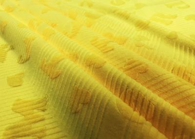 China 210GSM Soft 100% Polyester Embossed Alphabet Letters Micro Velvet Fabric - Yellow for sale