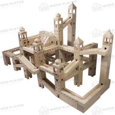 Chine Les puzzles en bois adaptés aux besoins du client du logo 122PCS marbrent les blocs en bois courus à vendre