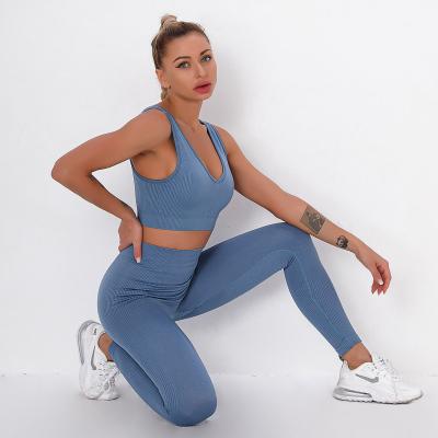China Fitness vest suit with seamless striped jacquard bra fitness yoga dress leggings woman for sale