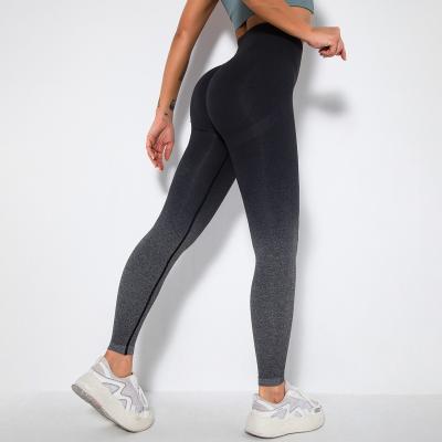 China Seamlessly tapered smiley face yoga pants tight butt gym pants sports running yoga dress woman for sale