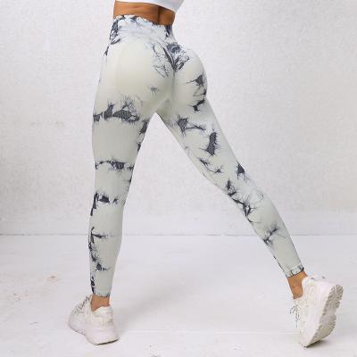 China Seamless tie-dyed yoga pants high waist hip lift elastic peach hip fitness running no embarrassment line pants for sale