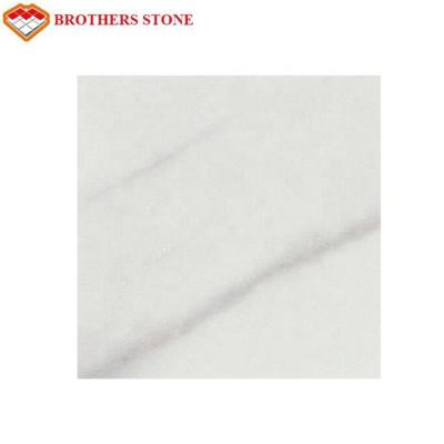 China 132.8 Mpa Compressive Property White Marble Flooring Border Designs For Fireplace for sale