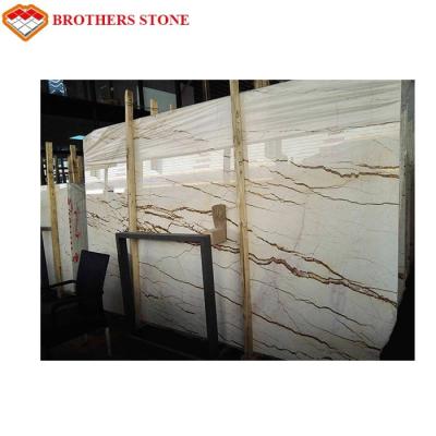 China Unmagnetized Sofitel Gold Marble Stone Slab For Interior Wall Cladding for sale